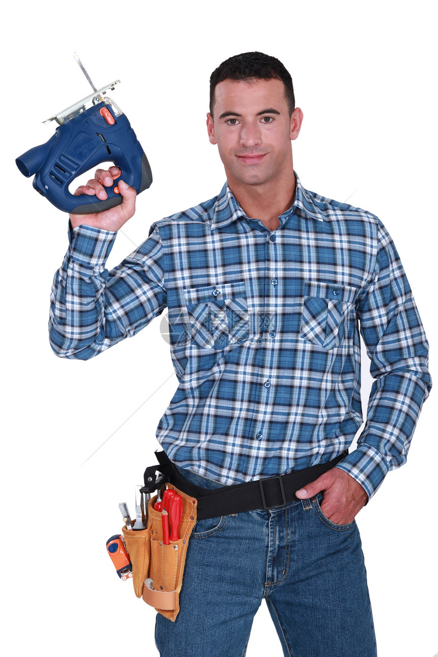 带电锯的人工作职业工人电气男人电池工具蓝色承包商微笑图片