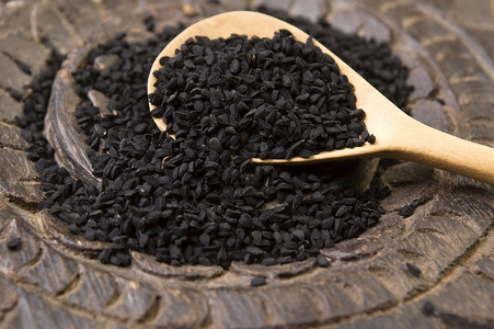 奈杰拉种子香料烹饪选择性粮食美食黑种草棕色焦点食物重量背景图片