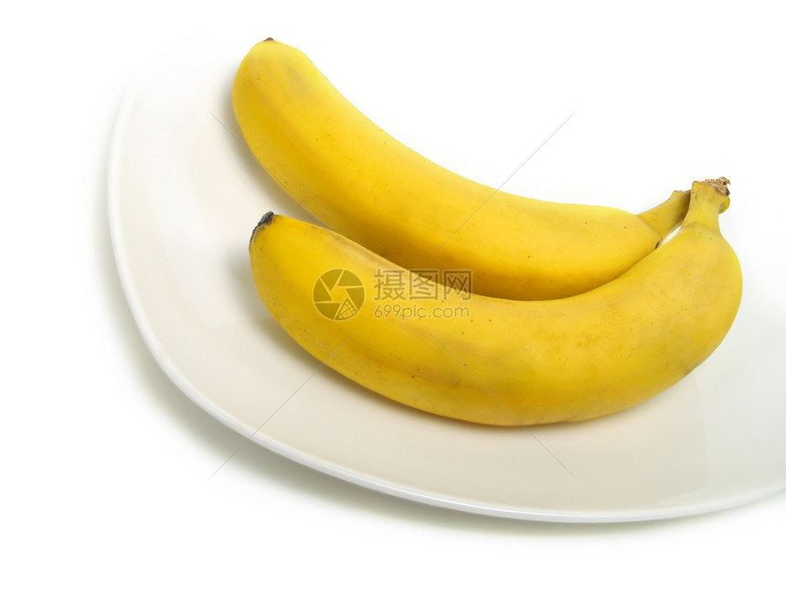 香蕉在盘子上维生素植物健康饮食素食曲线肉质水果味道热带甜点图片
