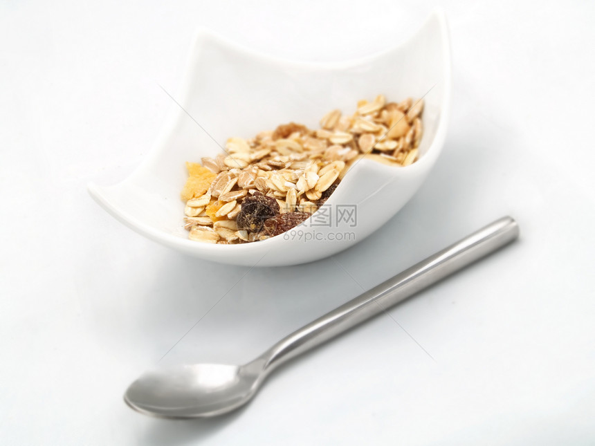 白碗里的谷物玉米片小吃食谱薄片味道维生素餐厅营养白色盘子图片