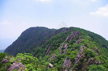 夏季的莫纳因首脑地质学色调石头青金石天气爬坡游客山腰旅行图片