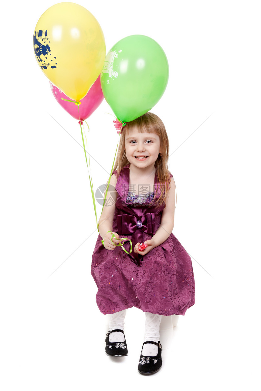 一个带着气球的小女孩 拍着完全孤立的演播室照片幸福金发女郎女性乐趣女儿生日孩子玩具庆典工作室图片