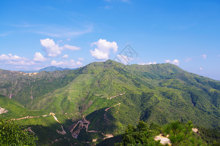 美丽的中国山吸管岩石衬套地平线石头山坡风景顶峰杂草灌木丛背景图片