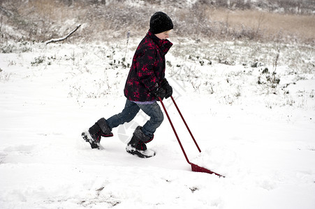 铲雪雪打扫孩子降雪天气青少年帮助往返乐趣白色工作背景图片