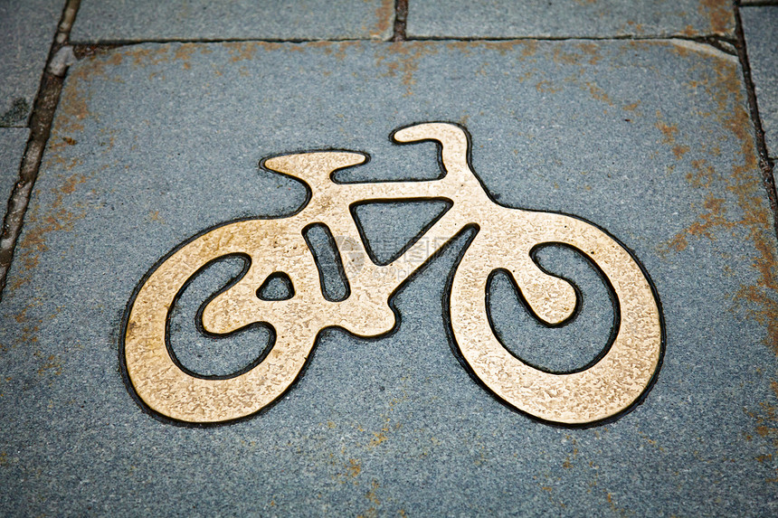 自行车车道运输黄铜路标城市石头铺路生态街道花岗岩青铜图片