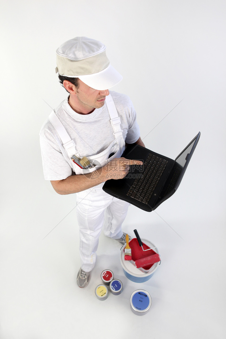 带有笔记本电脑的装饰交易画家白色相机滚筒互联网工人领班电话男人图片