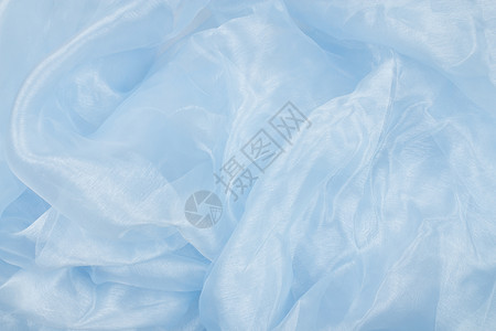 蓝边面背景纺织品丝绸窗帘曲线布料织物热情天鹅绒涟漪奢华背景图片