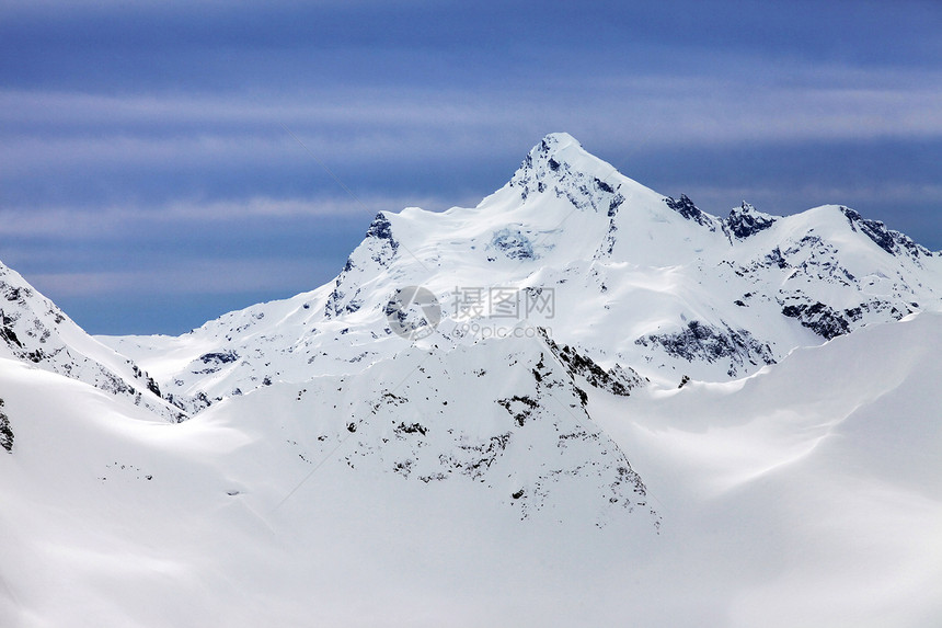 山山脉阳光蓝色天空登山爬坡闲暇冻结旅游晴天冰川图片