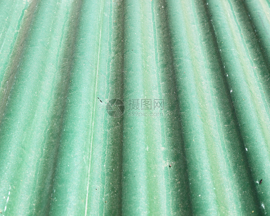 旧绿色金属屋顶纹理边界控制板涟漪线条瓦楞建造拉丝栅栏床单材料图片