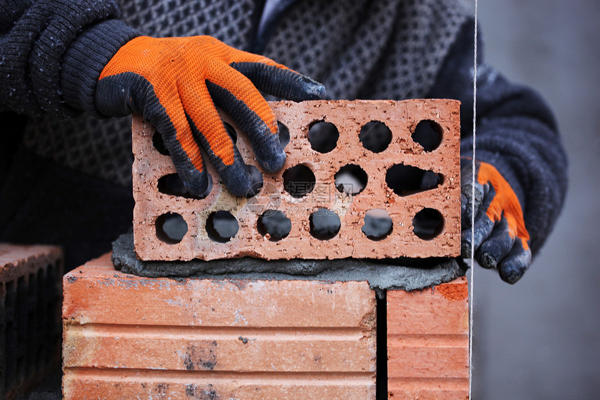 建筑工砖工人砖匠技术职场水泥石匠建设者砂浆头盔男人维修工作图片