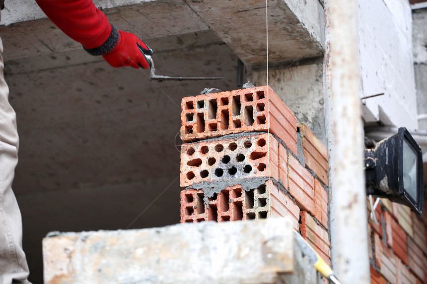 建筑工砖工人砖匠技术石匠工匠石头工具劳动者维修安装职场头盔图片