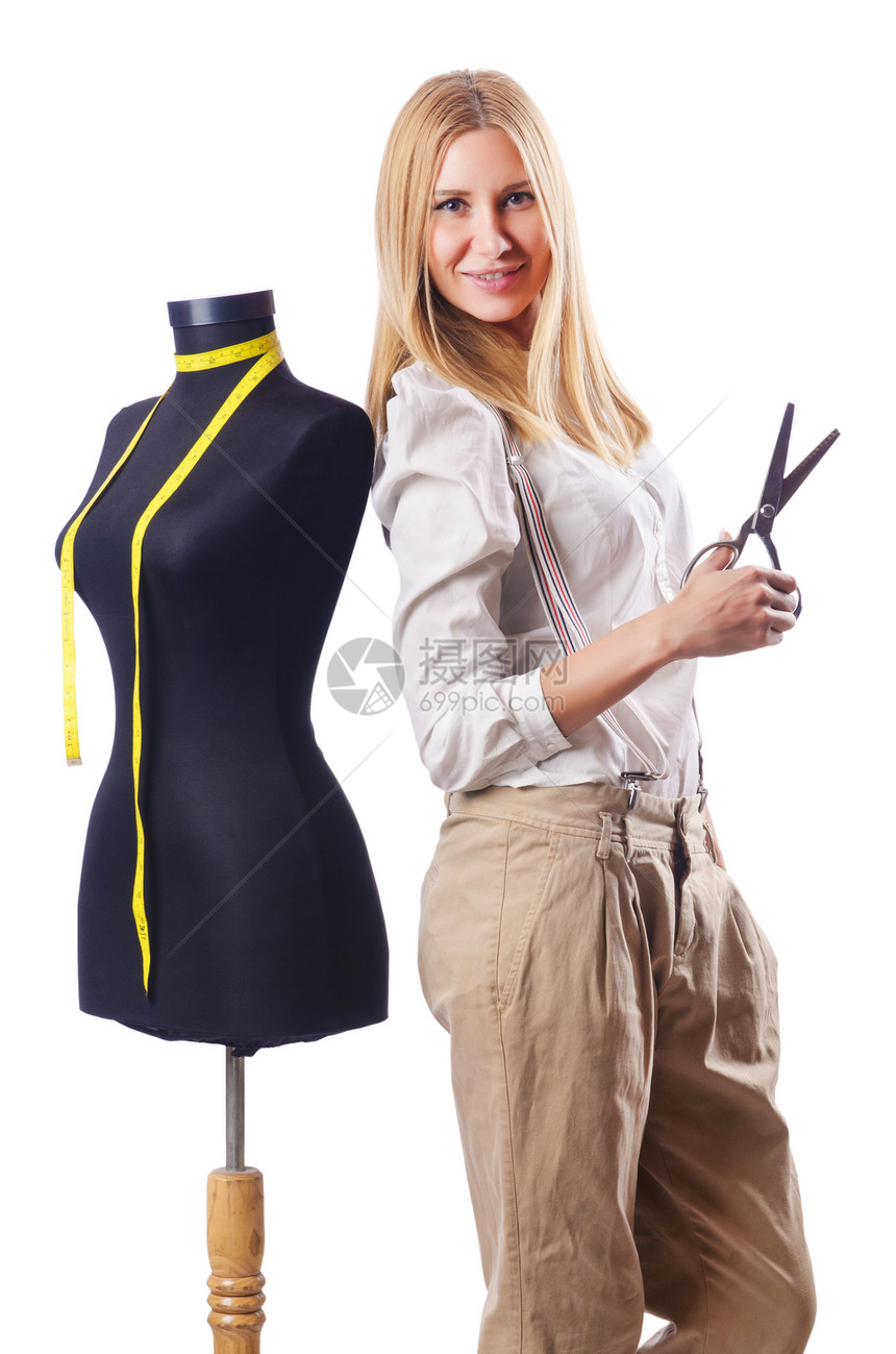 工作在礼服的妇女裁缝套装剪刀数字手工业商业仪表衣服女孩纺织品时装图片