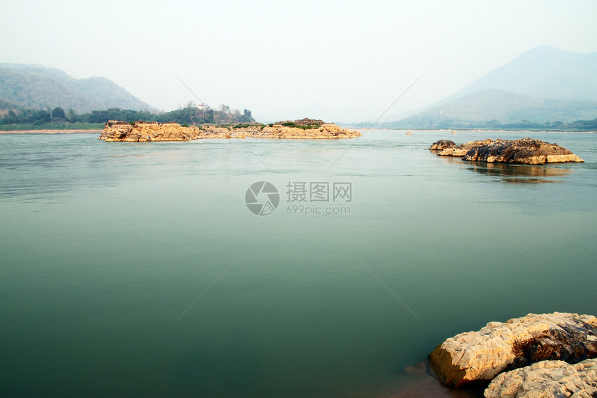 Loas和泰国边境的湄公河血管木头蓝色游客旅行晴天天空热带航程旅游图片