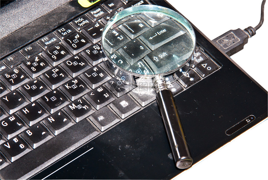 笔记本电脑黑色侦探镜片商业好奇心监视扫描研究放大镜人士图片