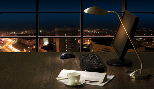 夜间办公室景观城市窗户建筑工作天空电话电脑职业风景背景图片
