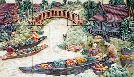 泰国寺庙墙上的泰国土著文化Thai Stucco工艺农村绘画传统奶牛雕塑宗教雕像手工水泥背景图片