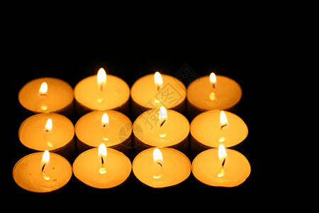 蜡烛损失烛光场景橙子悲伤教会宗教庆典记忆火焰背景图片