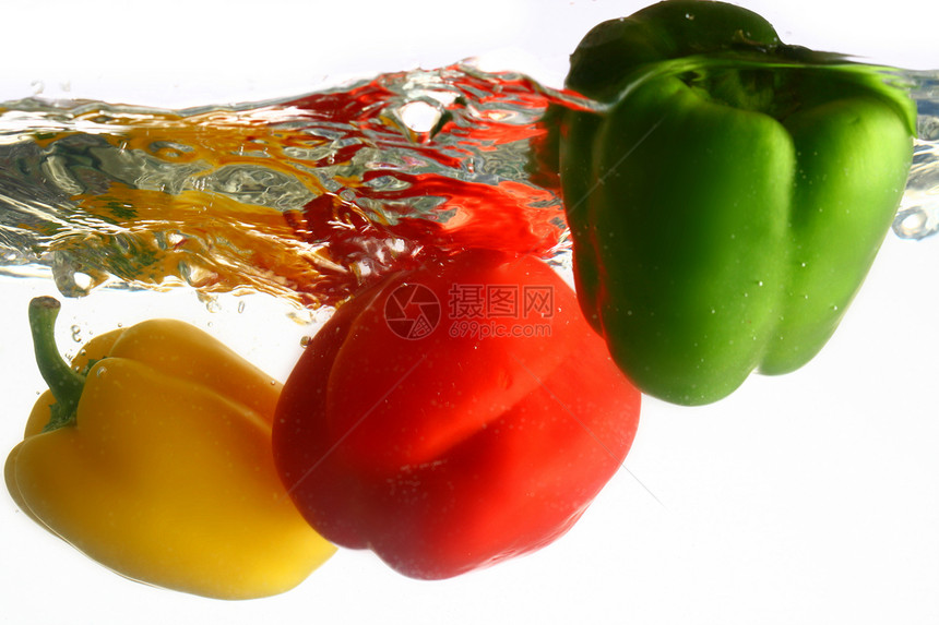 螺旋喷洒烹饪水果蔬菜辣椒沙拉美食宏观橙子食物香料图片