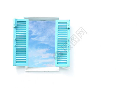 带有蓝色天空视图的希腊风格窗口背景图片