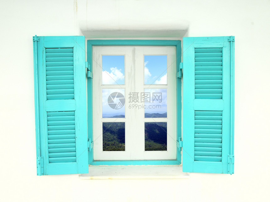 带有山和天空视图的希腊风格窗口蓝色建筑场景窗户装饰品晴天房子办公室房间村庄图片