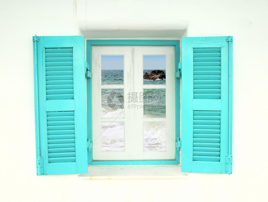 带有海视图的希腊风格窗口场景海浪房间建筑学玻璃建筑商业石头海岸蓝色图片
