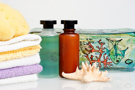 挤压式洗发水Spa 套式星星瓶子洗发水香脂淋浴小瓶洁净凝胶毛巾化妆品背景