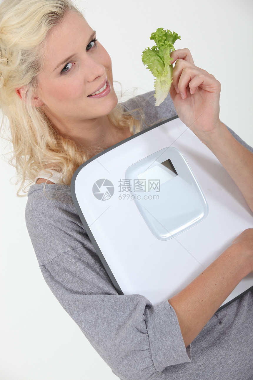妇女饮食蔬菜展示女士金发女郎营养素营养头发身体重量损失图片