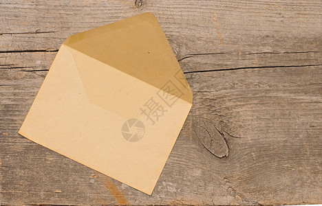 木制背景的旧信封 有复制空间棕色床单空邮邮政风化古董空气木板邮戳空白背景图片