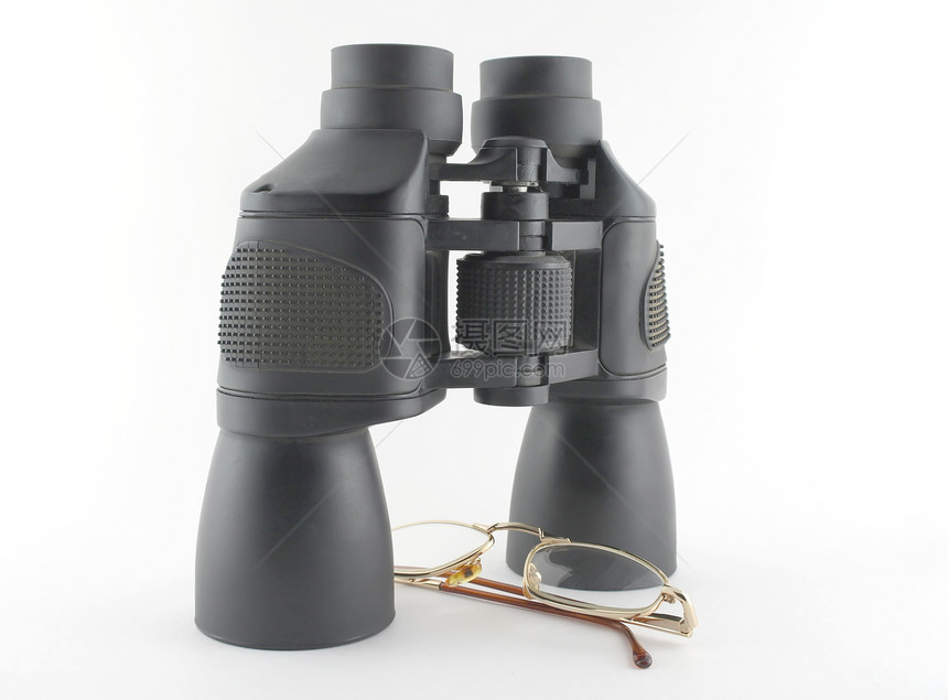 白色之上的望远镜和眼镜黑色战略间谍棕色阴影监视光学带子乐器眼睛图片