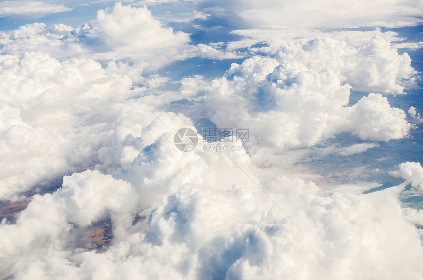 从空中飞机上取来的云自由蓝色风景层云环境天堂气象窗户阳光天空图片