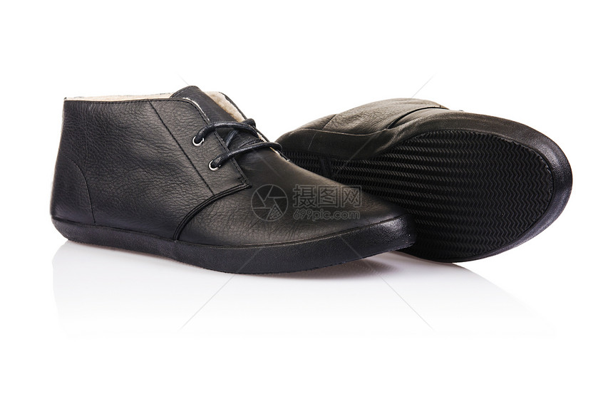 白色男性鞋子的时装概念反射正装骡子鞋类男人黑色橡皮齿轮脚跟靴子图片