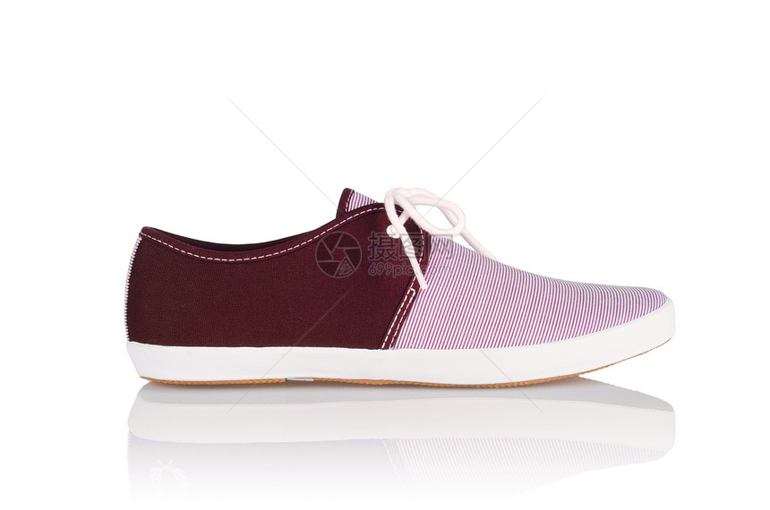 白色运动鞋概念中运动鞋的体育鞋鞋带橡皮衣服运动靴子足球男性蕾丝紫色活动图片