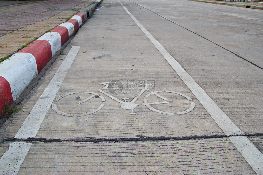 城市的自行车路标街道信号小路旅行轮子小径途径安全斑点地面图片