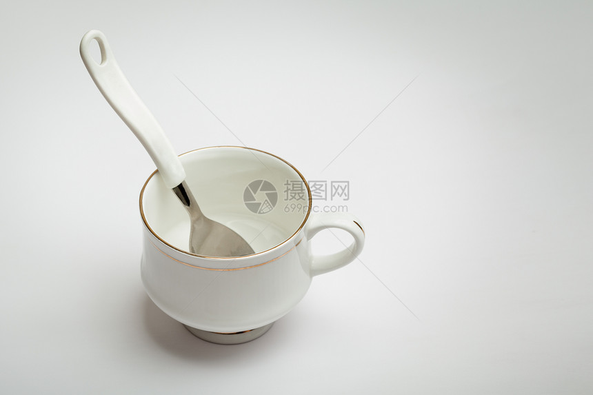 白杯和勺子食物环境金属咖啡店杯子咖啡服务陶器工具白色图片