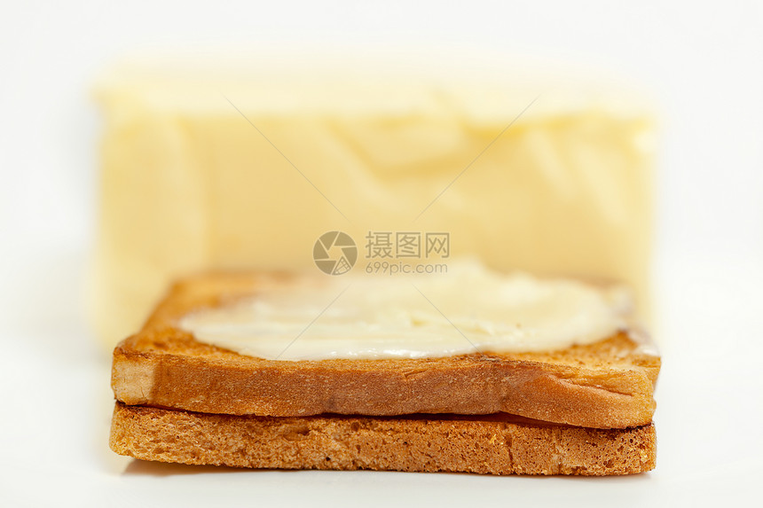 面包和黄油立方体奶油黄色粮食晴天午餐环境小麦美食饮食图片