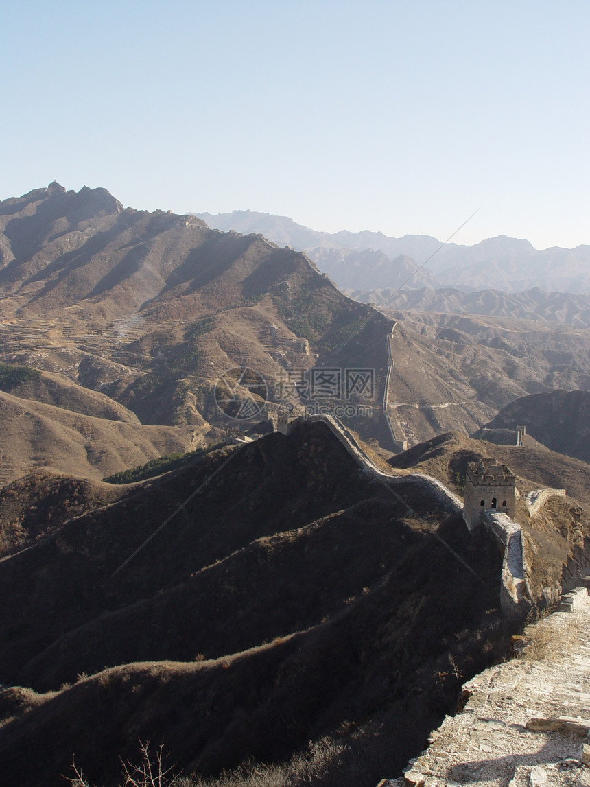 中国的长城丘陵蓝色边界山脉石头天空远足旅行图片
