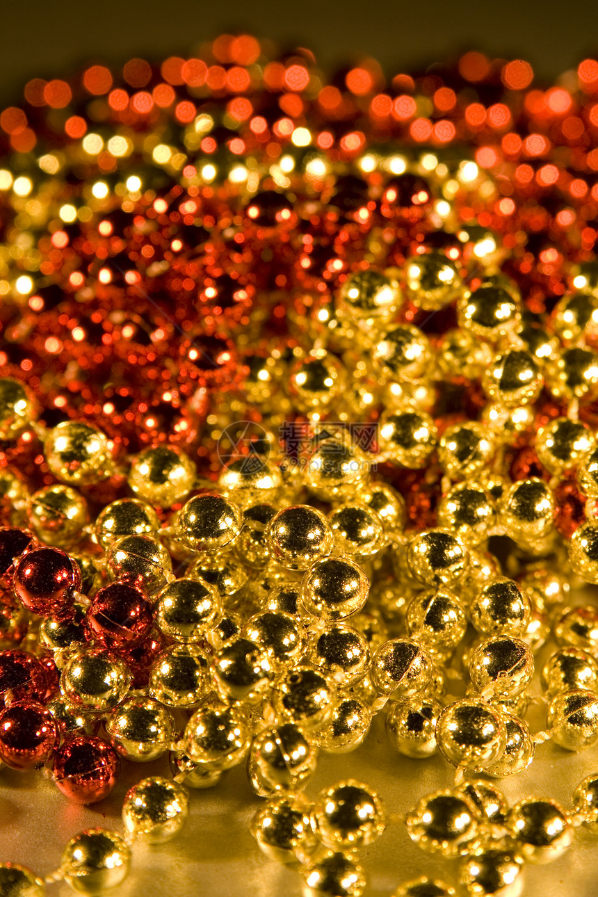 用于背景圣诞节设计元素的火花珠子红色金子装饰品图片