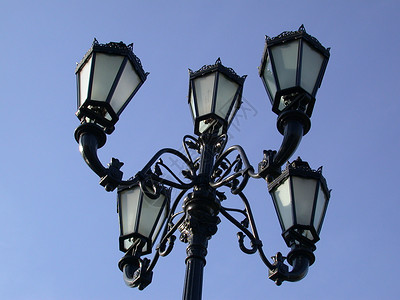 街灯艺术铸铁金属灯笼锤击城市背景图片
