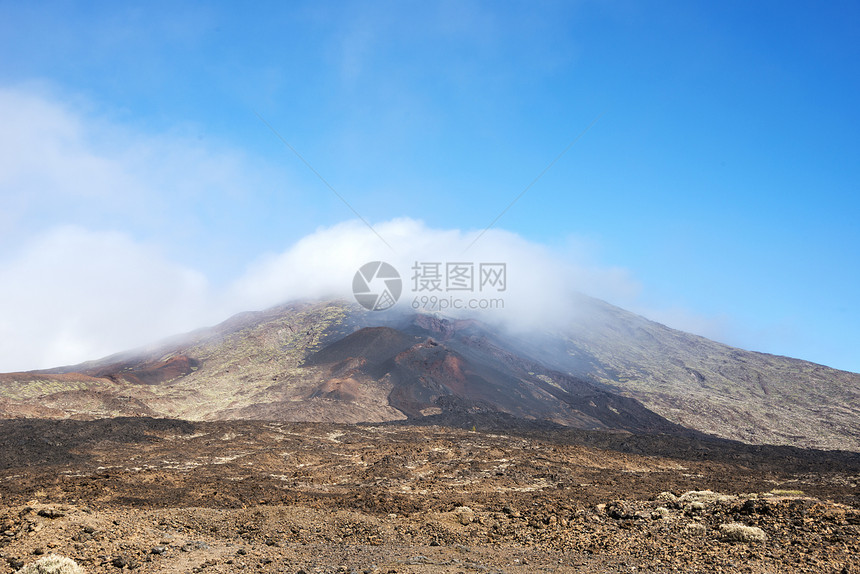 生命中的伏尔卡诺热带自然白色天空蓝色火山图片