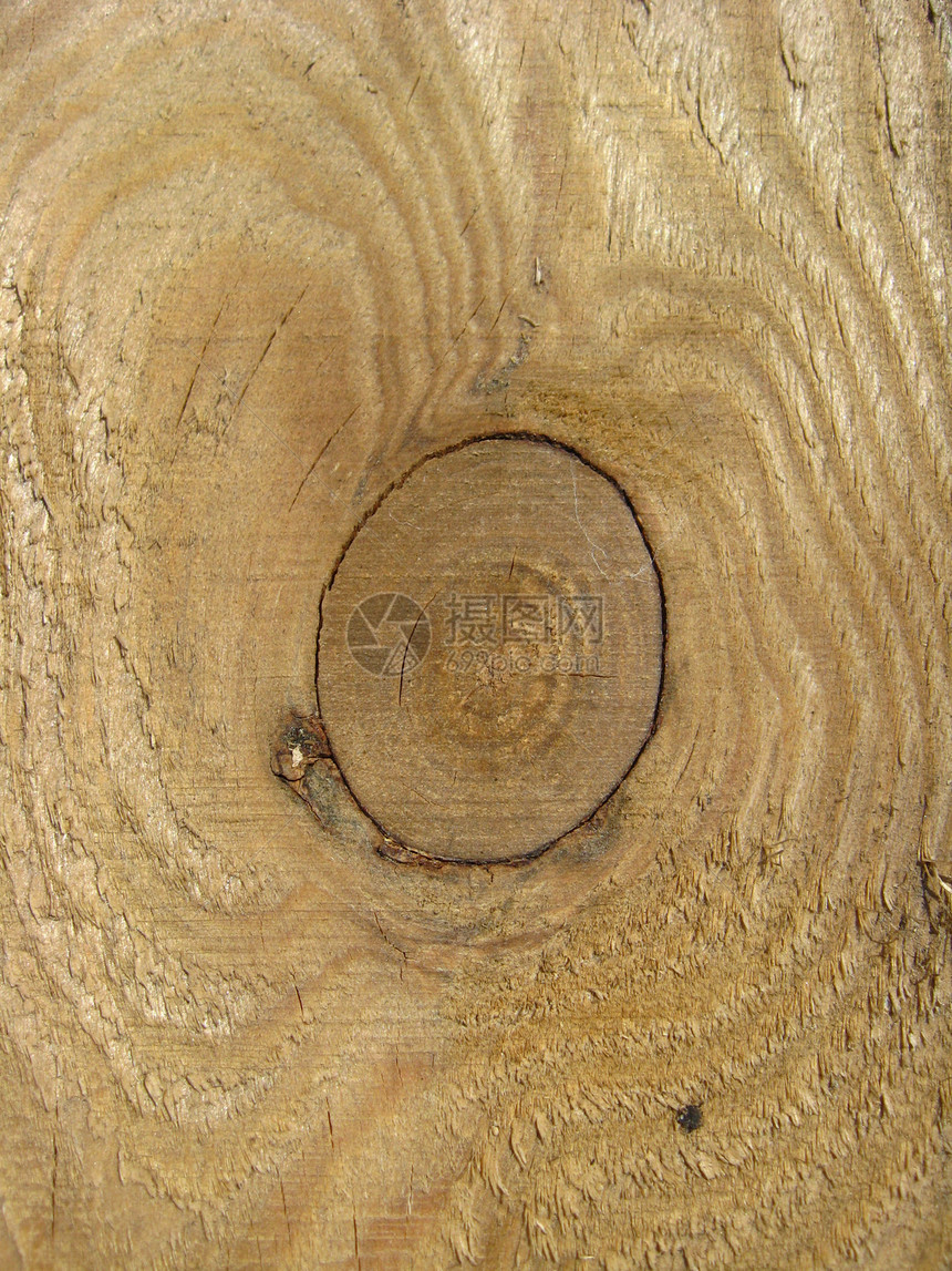 一棵树的切片图案黄色材料生活裂缝森林木匠木板锯末木工电锯台图片