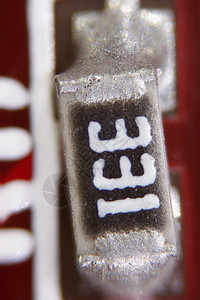 电子学显微缩微图打印晶体管蚀刻显微镜电气电阻器反抗者焊接照片显微背景图片