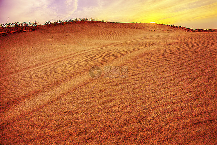 沙丘气候橙子太阳干旱风景沙漠天空荒野日落旅行图片