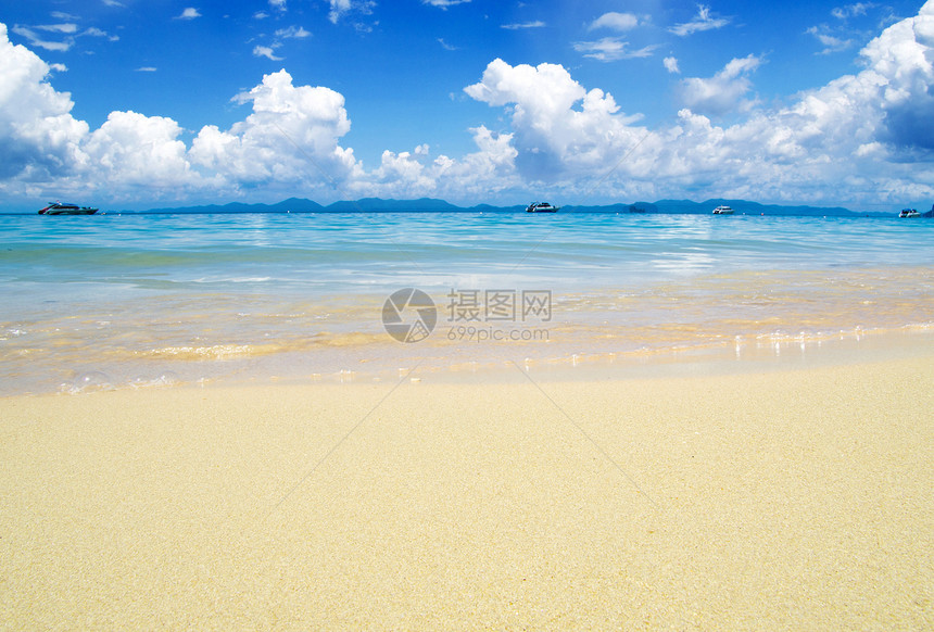 沙滩和热带海旅行蓝色海浪海洋天空支撑假期太阳天堂阳光图片