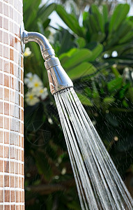 花洒水龙头淋浴热带蒸汽卫生蓝色浴室卷曲火花洒水器植物合金背景