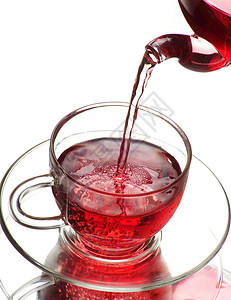 茶茶杯杯子叶子液体玻璃棕色概念水平一杯茶橙子红色背景图片