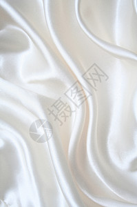 平滑优雅的白色丝绸反光海浪折痕涟漪材料纺织品投标曲线银色布料背景图片