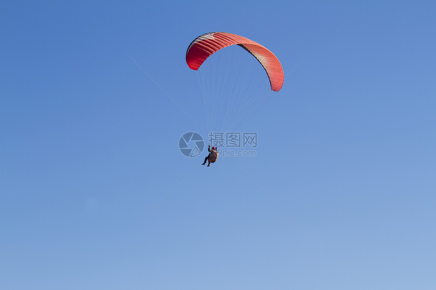 滑行滑动生活段落爱好橙子自由男人闲暇天空降落伞跳伞图片