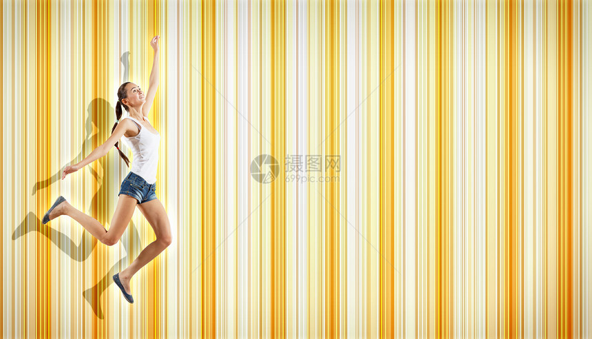 年轻女子跳舞跳跃姿势霹雳舞者舞蹈家艺术体操行动健身房灵活性女孩成人图片