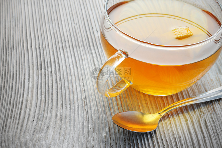 橙橙茶杯子水平早餐文化桌子木头生活方式橙子茶匙液体图片