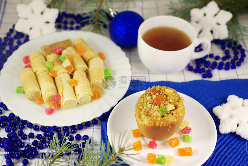 烤苹果餐巾甜点盘子新年装饰品黄色食物倾斜饮食宏观图片